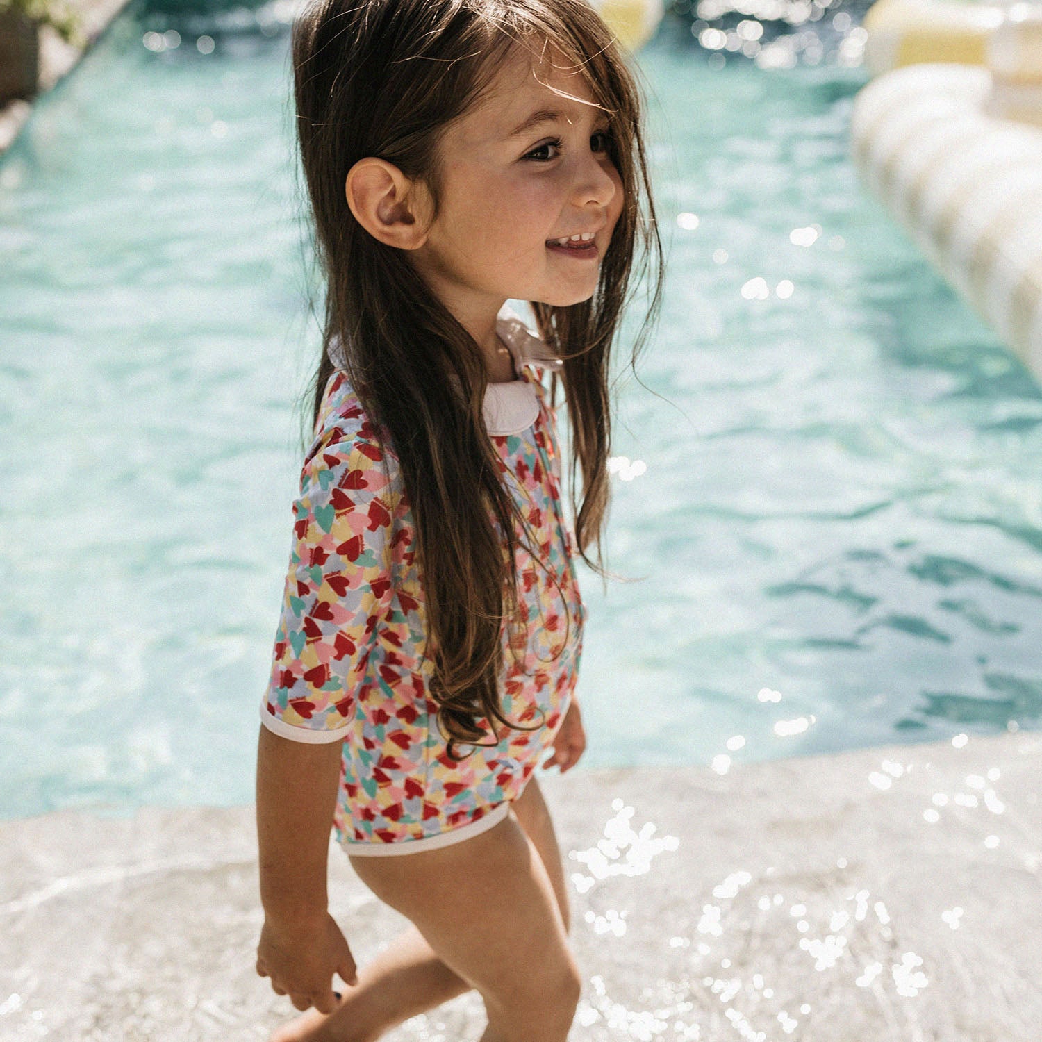 Bañador niña UV Coco Paris - corazones multicolor