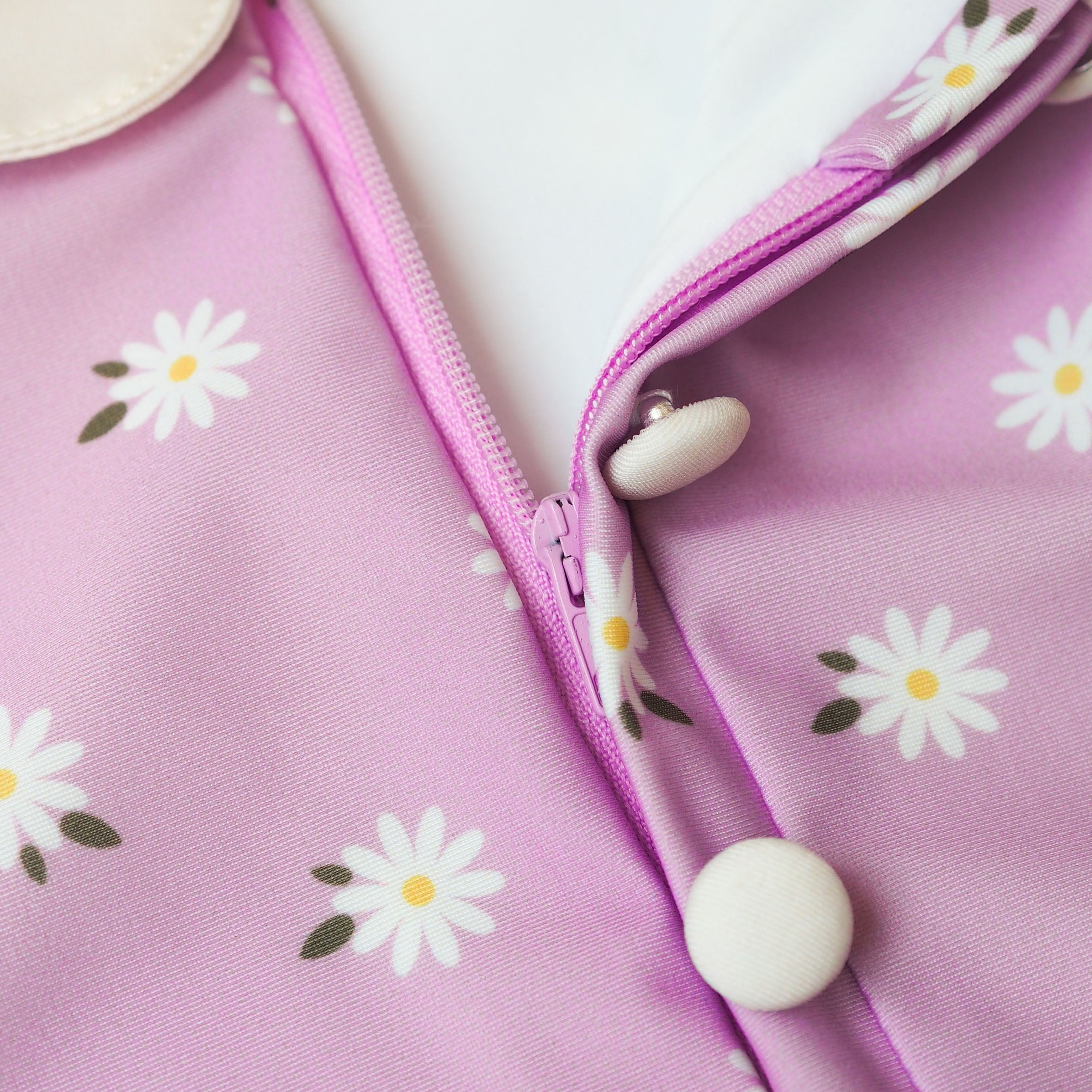 Bañador UV Niña Coco Florence - margaritas lilas