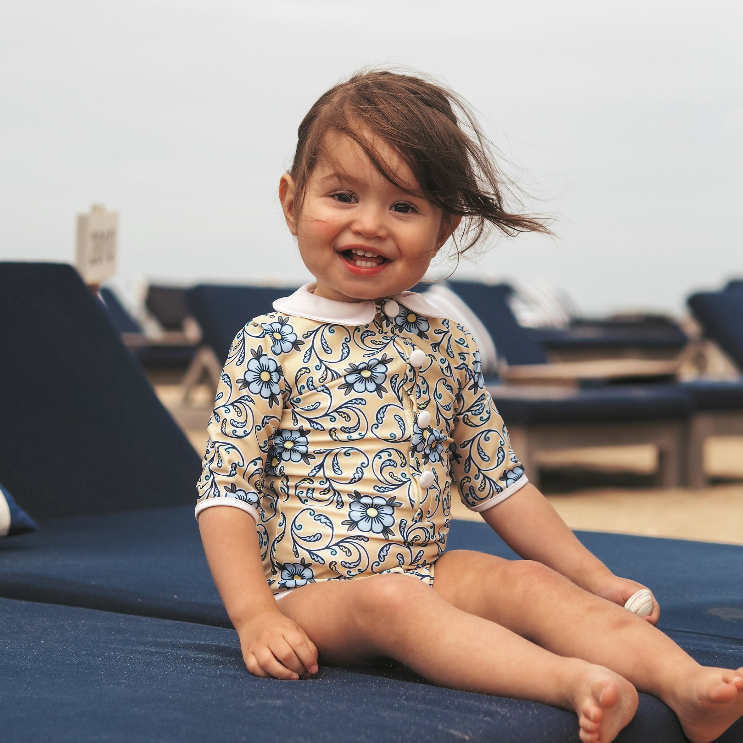 Baby Meisjes UV Badpak Coco Taormina - geel met blauwe bloemen