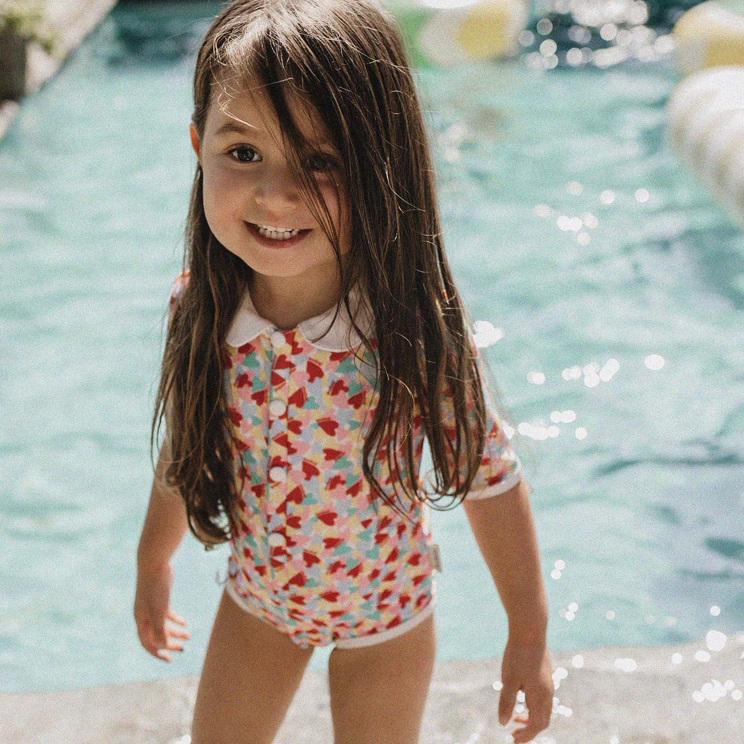 Bañador niña UV Coco Paris - corazones multicolor